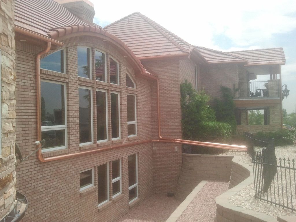 6 Inch Seamless Copper Half Round Gutter with Copper 4 Inch Round Downspout Broomfield Colorado