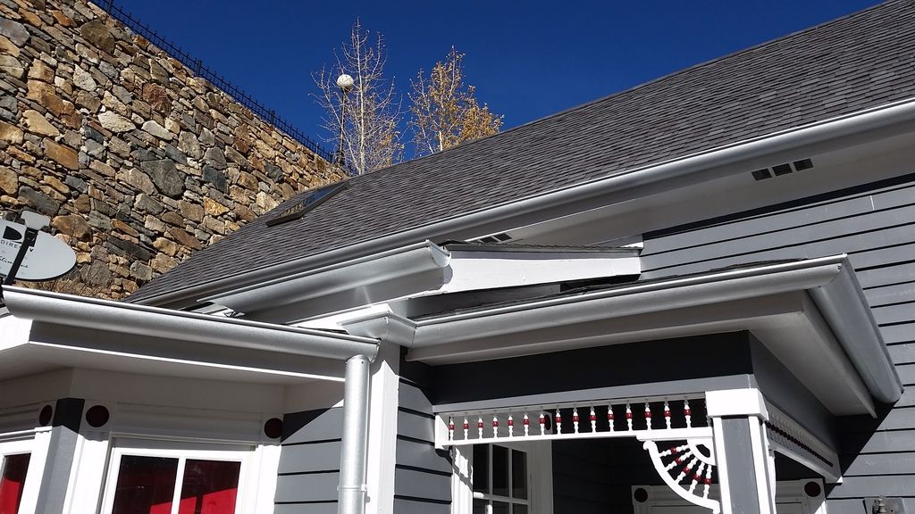 6 Inch Seamless Half Round Gutters with 4 Inch Round Downspout in Black Hawk Colorado