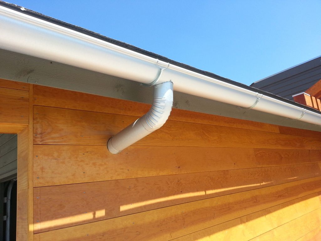 6 Inch Seamless Half Round Gutters with 4 Inch Round Downspout in Boulder Colorado