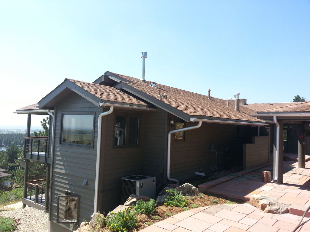 6 Inch Seamless Half Round Gutters with 4 Inch Round Downspout in Boulder Colorado