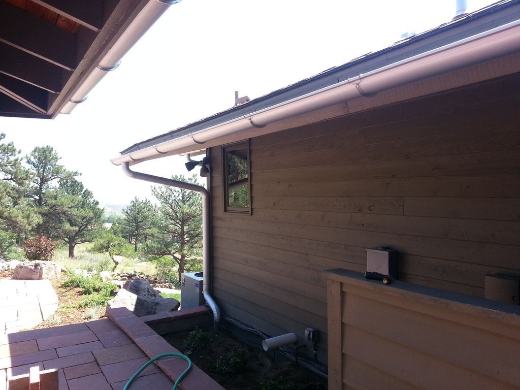 6 Inch Seamless Half Round Gutters with 4 Inch Round Downspout in Boulder Colorado