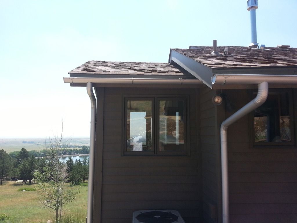 6 Inch Seamless Half Round Gutters with 4 Inch Round Downspout in Boulder Colorado