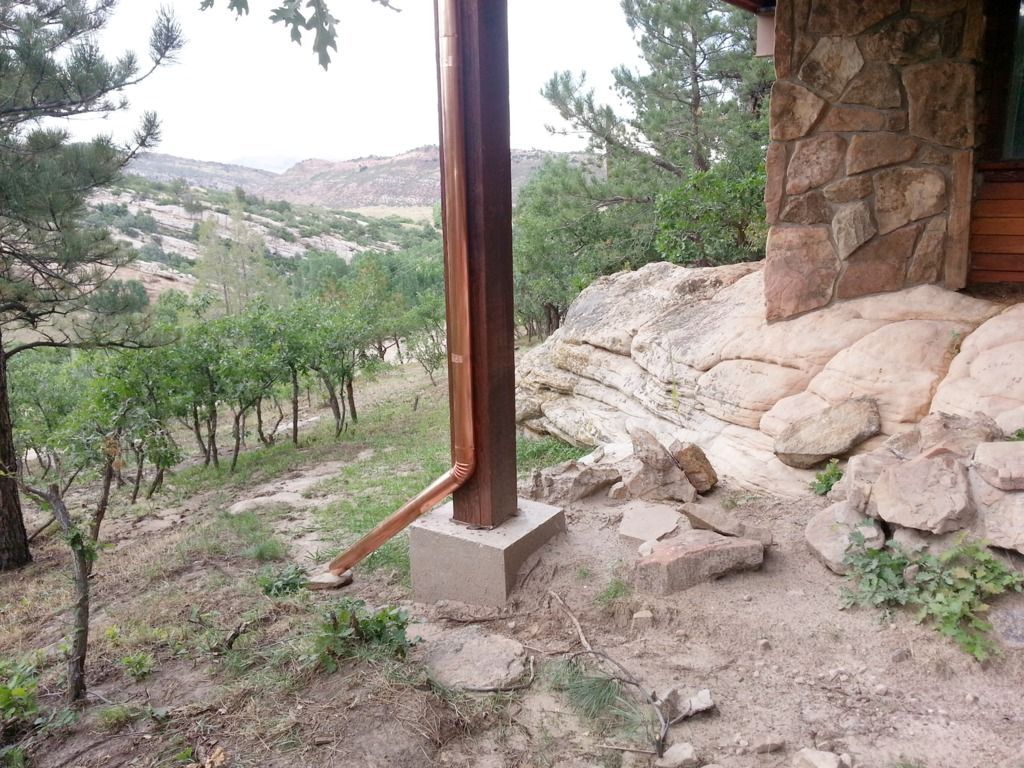 6 Inch Seamless Copper Half Round Gutter with Copper 4 Inch Round Downspout Evergreen Colorado