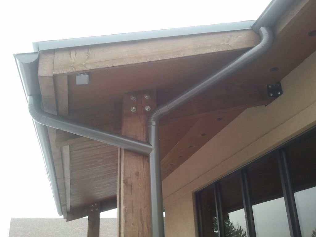 6 Inch Seamless Half Round Gutters with 4 Inch Round Downspout in Littleton Colorado
