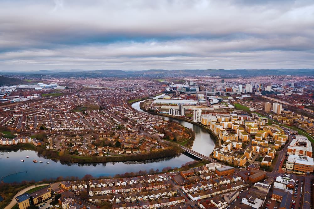 An Aerial View Of A City With A River Running Through It — Newcastle Moving & Storage in Cardiff, NSW