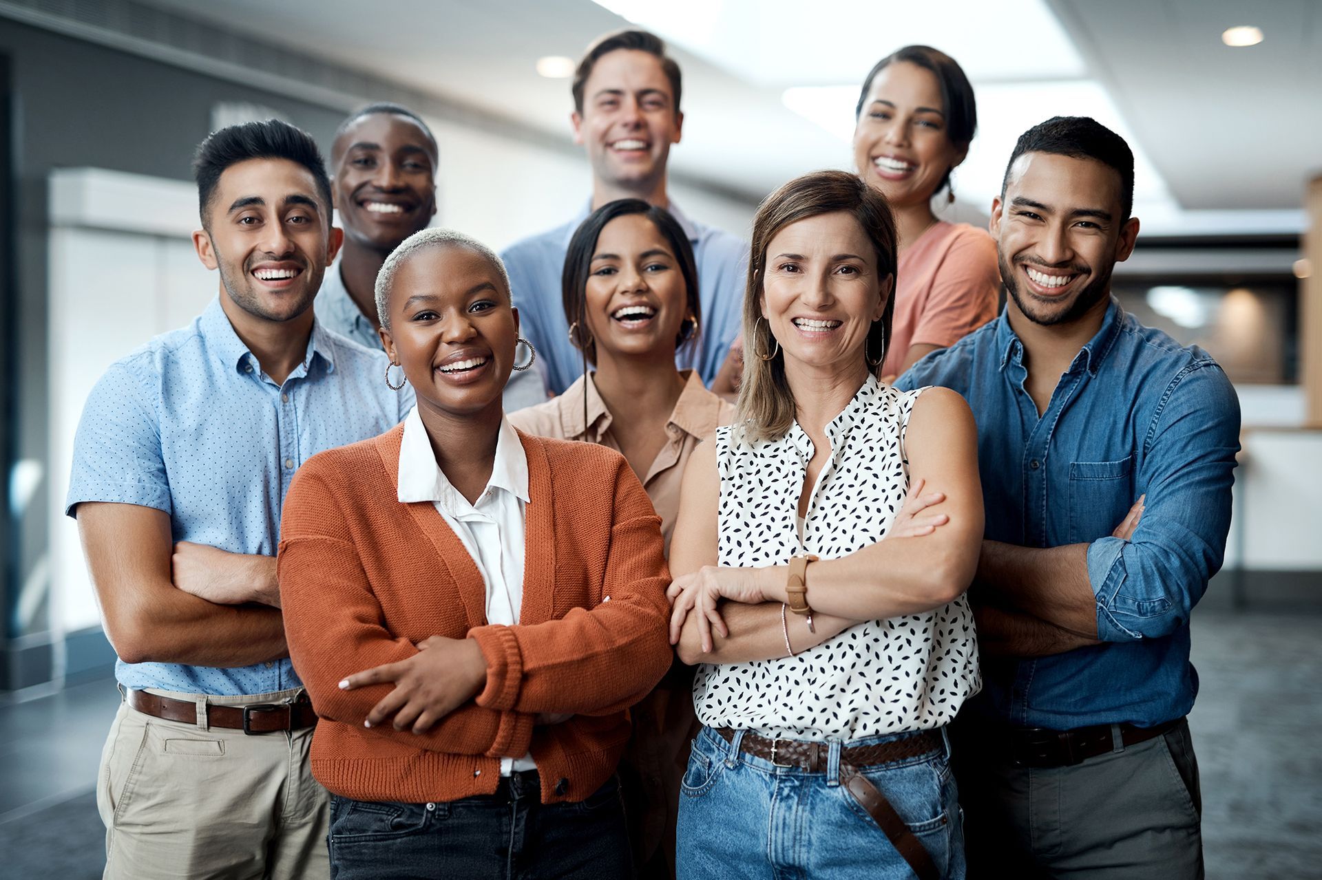 A group of people are posing for a picture together.