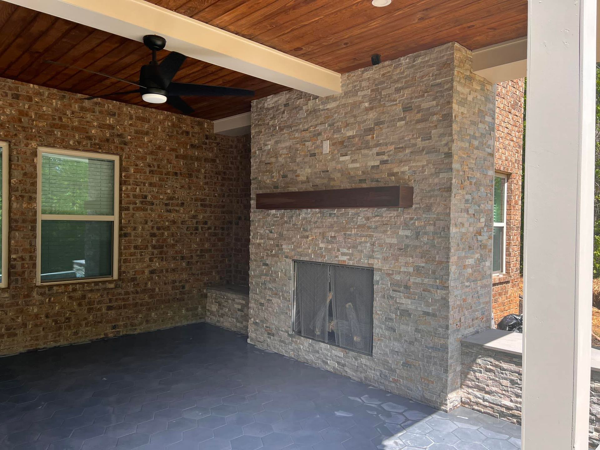 There is a fireplace in the middle of the room.