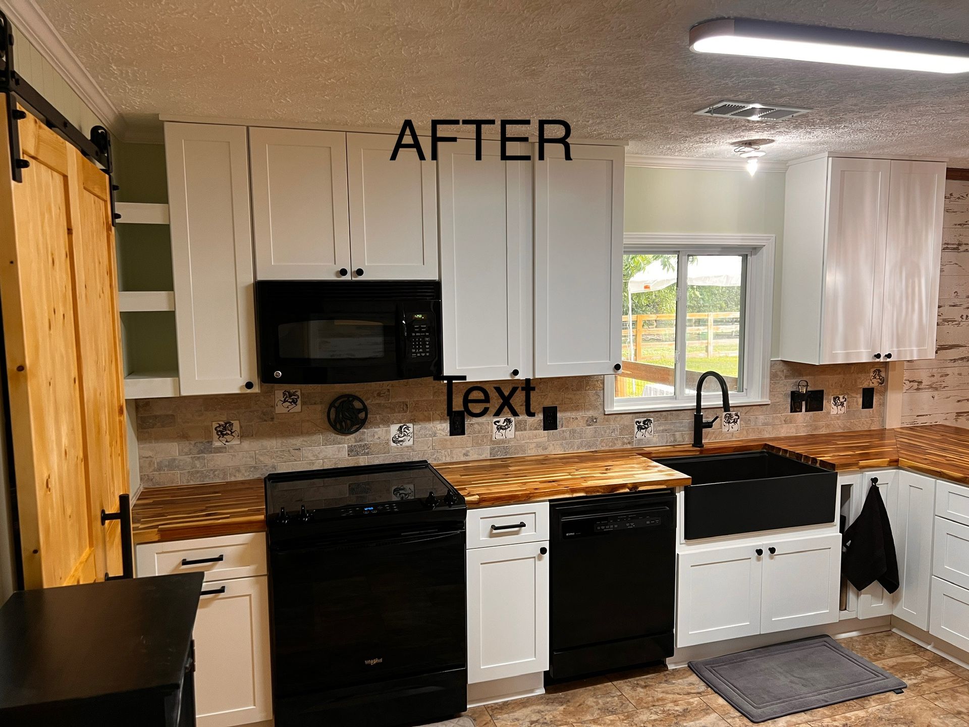 Updated kitchen with white cabinets, black appliances, and butcher block countertops.