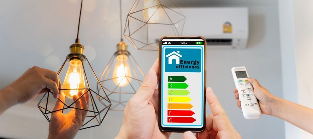 Man change a new electric bulb, open air conditioning 25 degrees make a home more energy efficient.