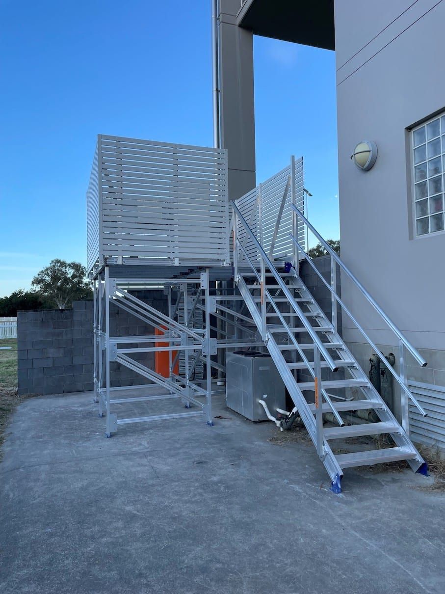 A set of stairs leading up to a building