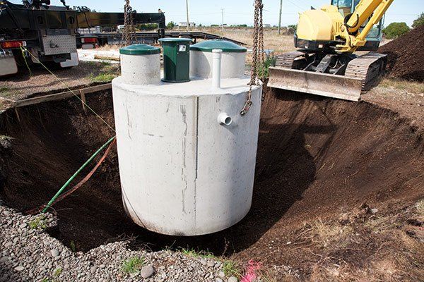 underground septic tank being installed