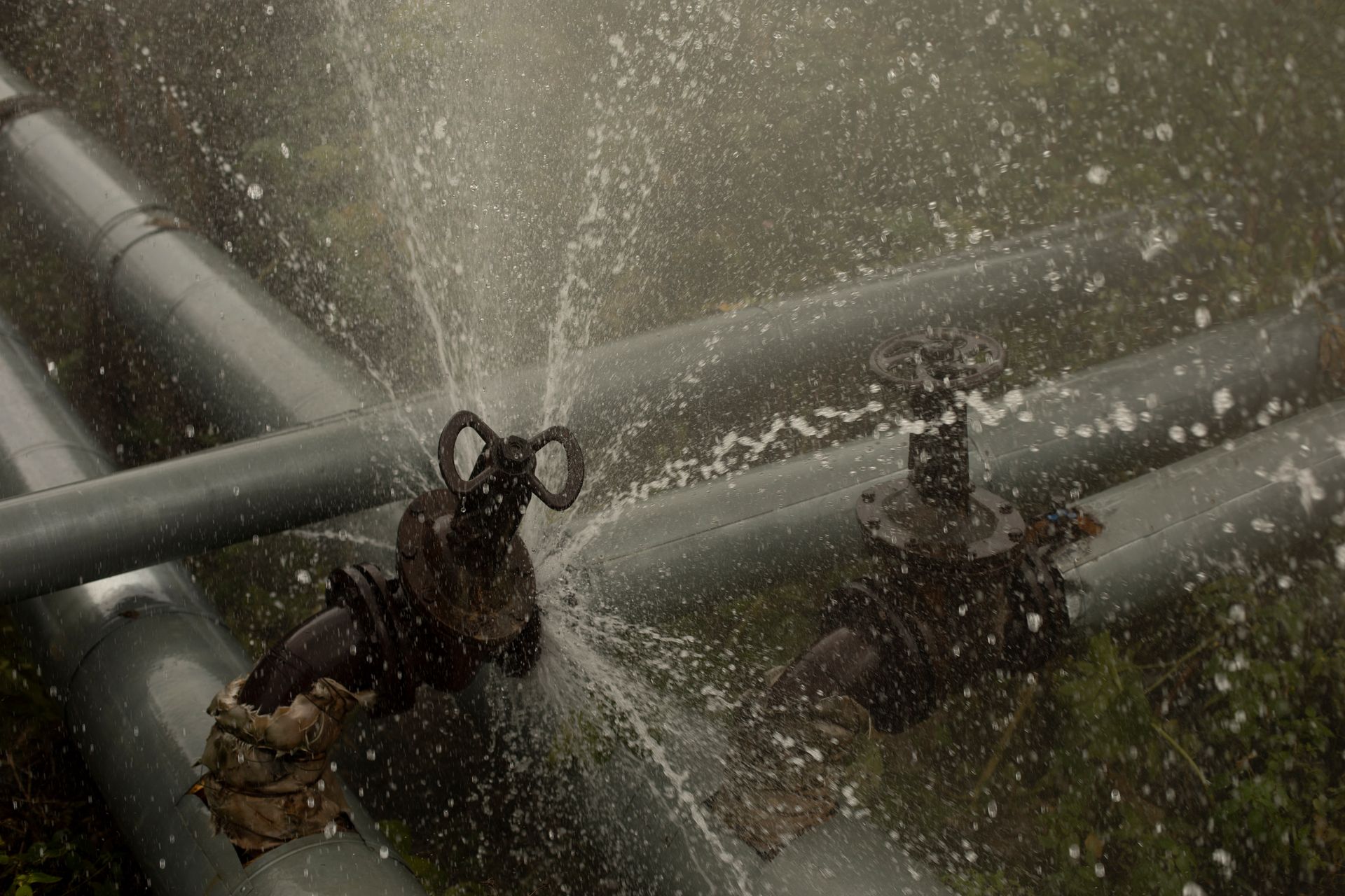 Water pours from pipes