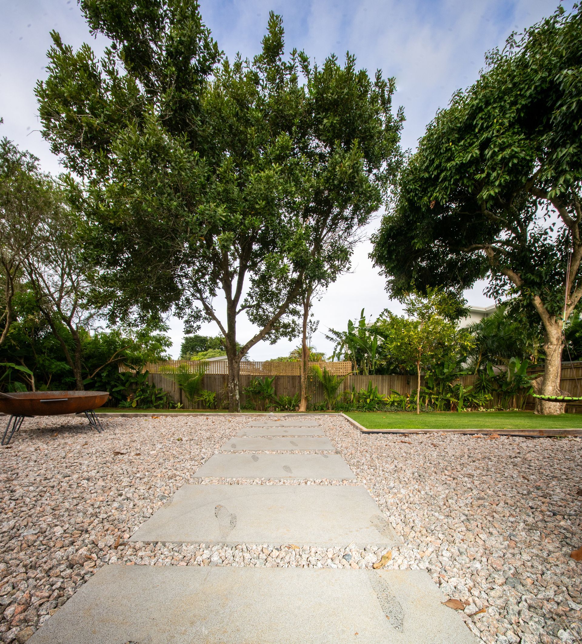 Person Smoothing Decorative Aggregate Around a Pool — Concrete Pool Projects in Seventeen Seventy, QLD