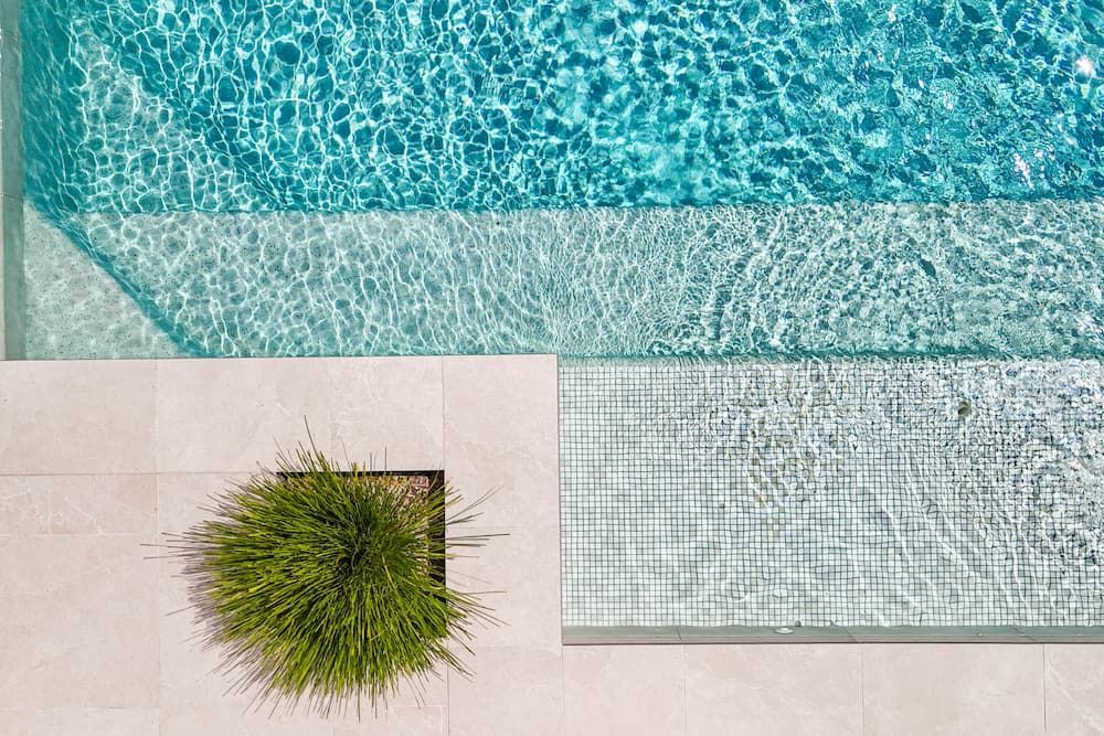 Overhead View of a Pool With Turquoise Water — Concrete Pool Projects in Gladstone Central, QLD