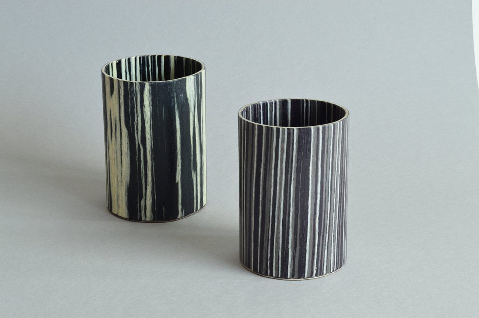 Beakers in mixed woods by Hugh Cummins at Olivier Cornet Gallery