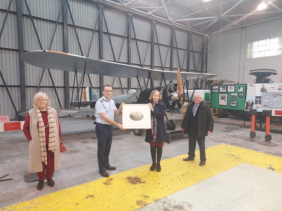 CIAS handing over print of WWW1 photo of a Nieuport to the Irish Air Corps Museum in Baldonnel