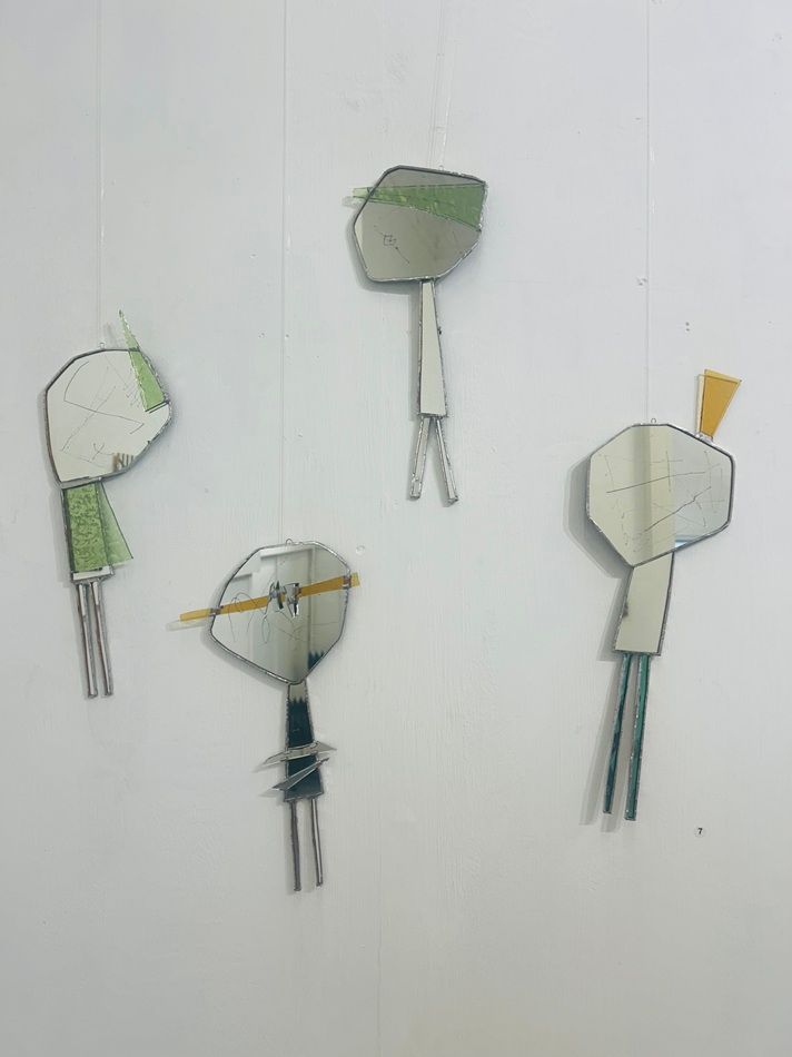 Flappers no. 1 to no. 4, a series of cut stained-glass and mirror works by Kelly Ratchford,  part of the Olivier Cornet Gallery's 2025 Bloomsday / Summer group exhibition Out of Lines