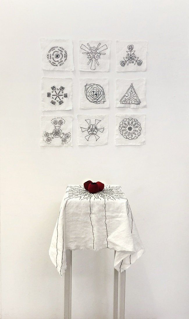 Ramona Farrelly, 'Offering', nine wall-hanging stitched pieces of linen (90x90cm) & three red felted wool vessels on a larger stitched linen piece (resting on a small square plinth), Olivier Cornet Gallery, Dublin