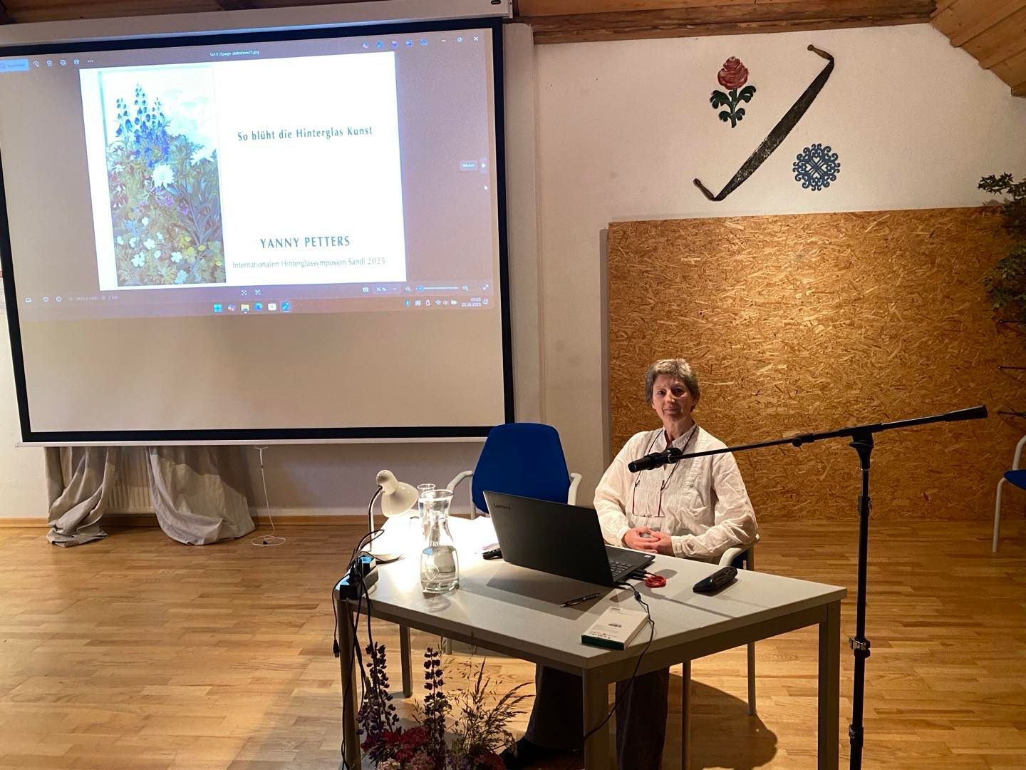 Yanny Petters about to give a talk about her practice at the Hinterglasmuseum, Sandl, Austria
