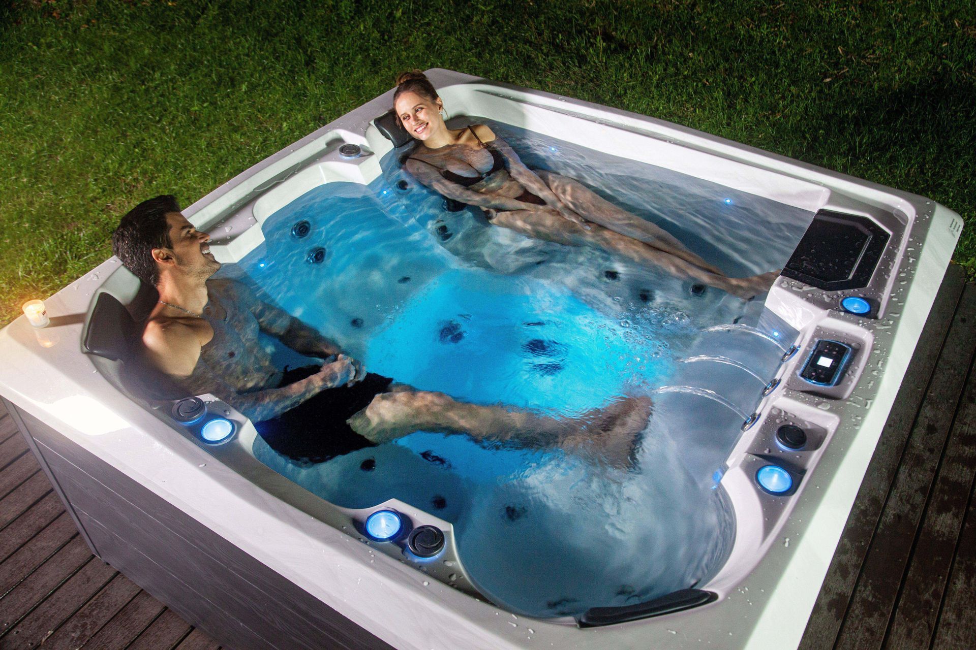 Pacific Spa hot tub being enjoyed by a couple