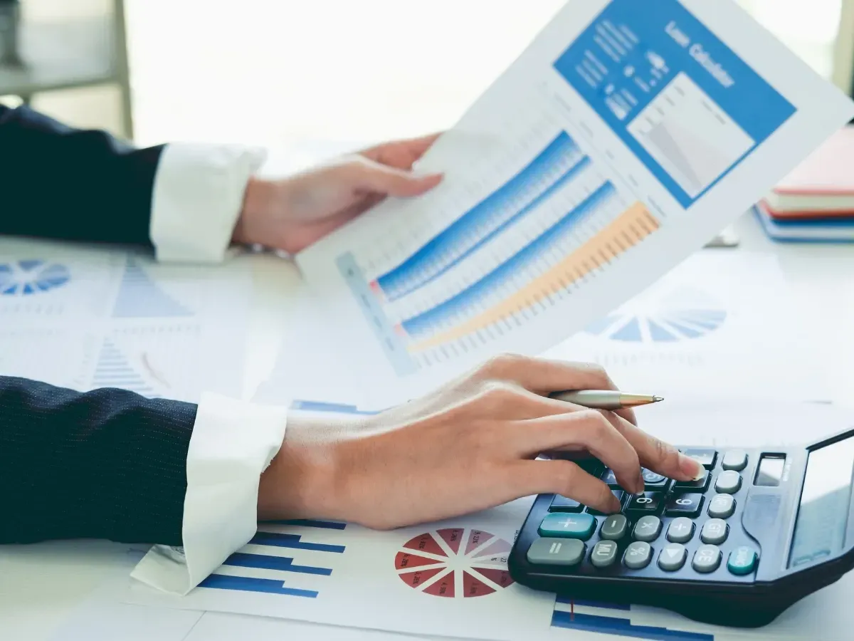 a woman checking records as part of her insurance accounting task