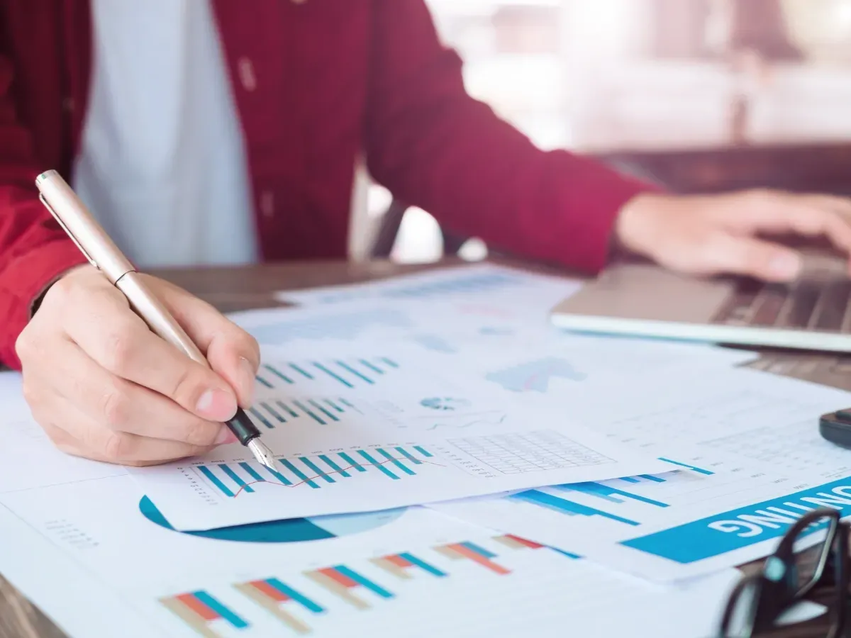 an insurance accountant reviewing a client's accounting and bookkeeping records