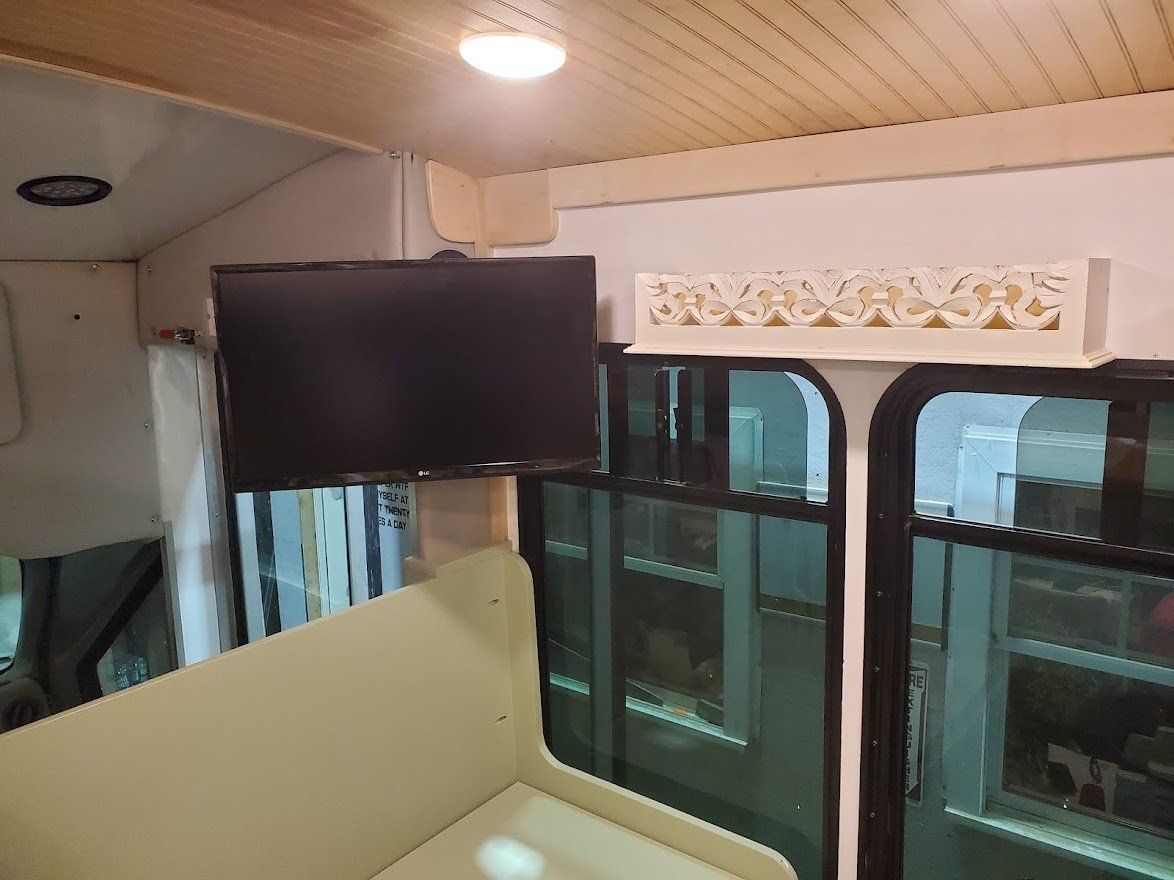 Inside The Bus With Tv Area  - Milton, NH  - RV Service and R & L Van Builds