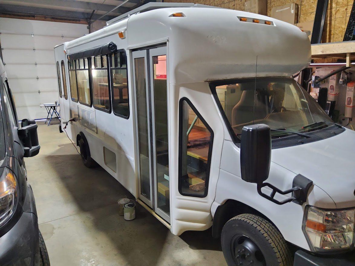 White Bus Parking - Milton, NH  - RV Service and R & L Van Builds