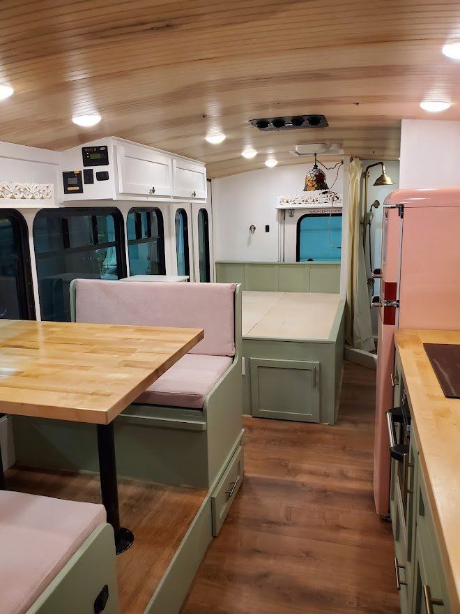 Inside Bus With The Table Area - Milton, NH  - RV Service and R & L Van Builds