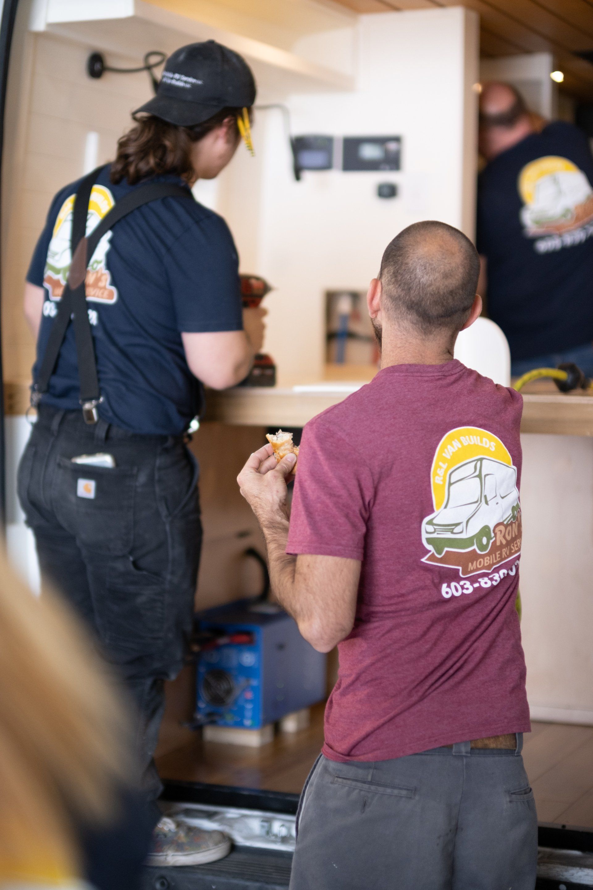 Two Staff Maintaining The Camper Van - Milton, NH  - RV Service and R & L Van Builds