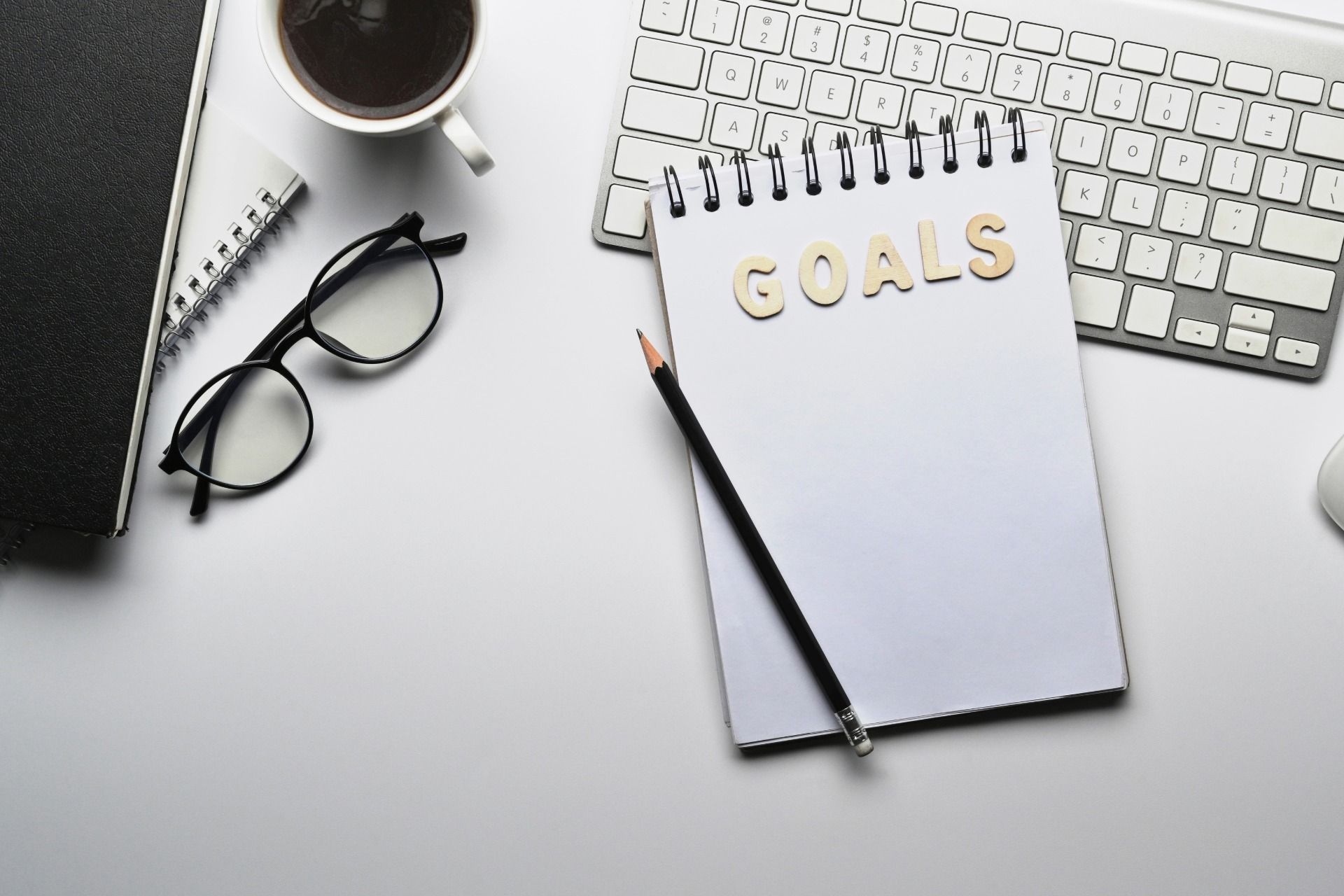 Desk with notebook labeled 