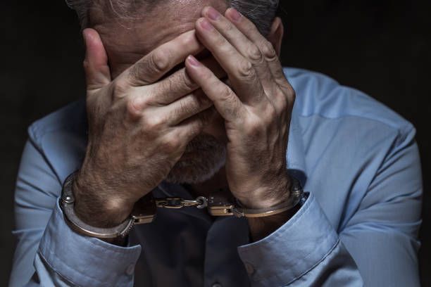 A man needing help from a trusted bail bonds company after being arrested.