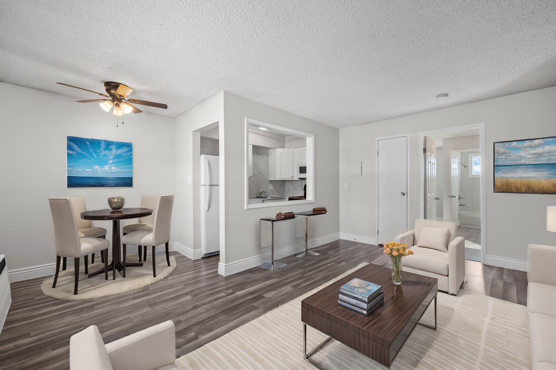 Photo of a living room with white furniture
