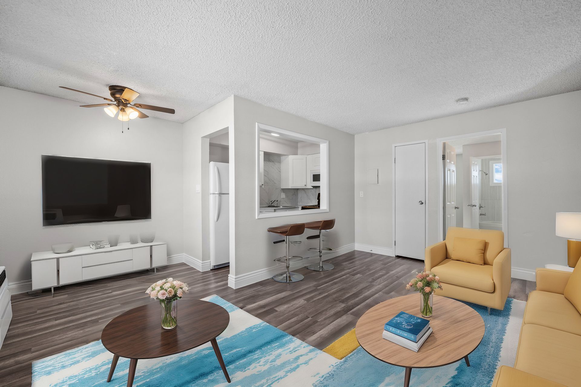 Photo of a living room with yellow furniture