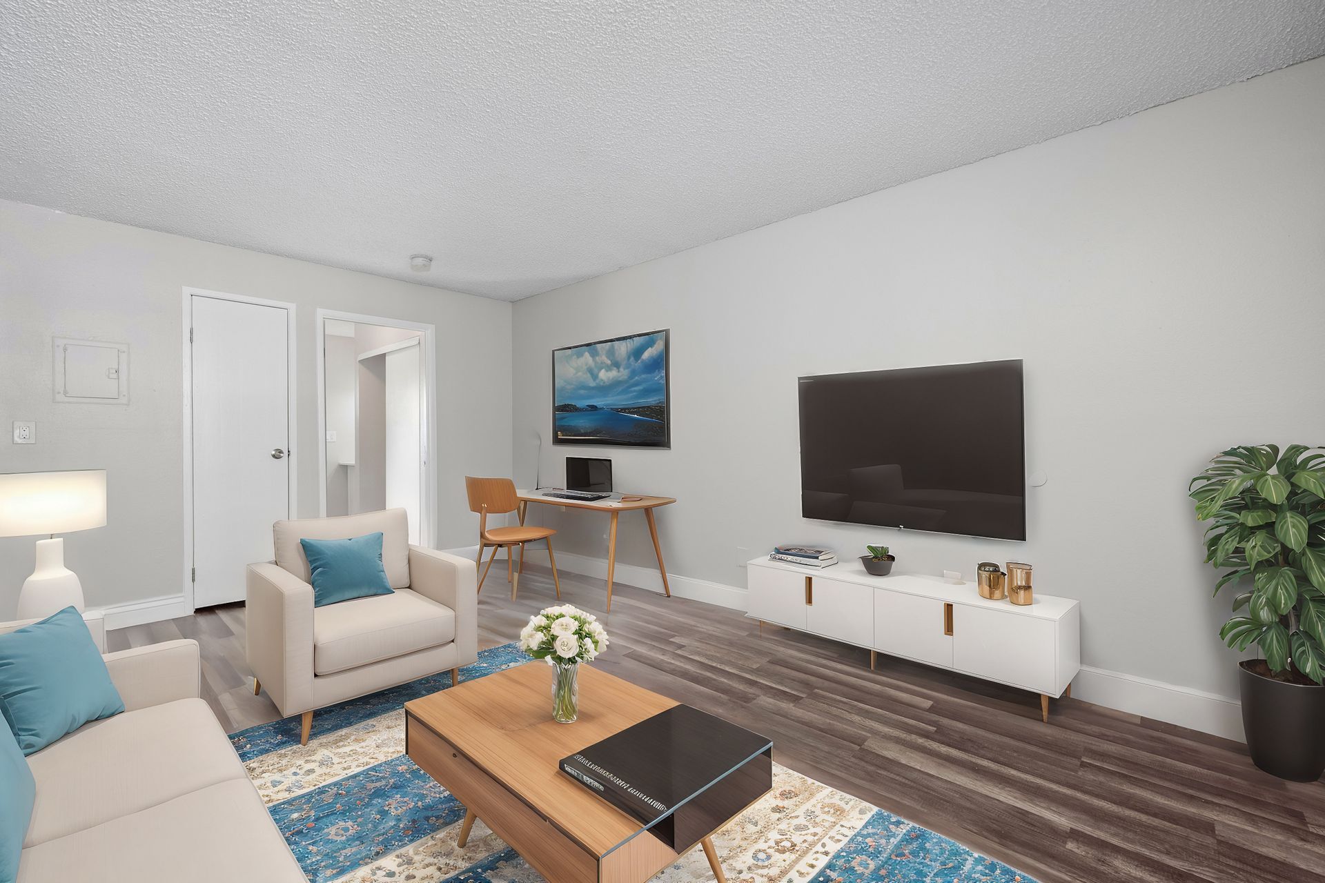 Photo of a living room with blue and white furniture