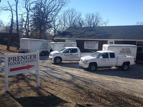 Prenger Floor Covering service trucks and building - Floor Installation in Jefferson City, MO