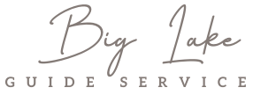 A logo for big lake guide service on a white background.