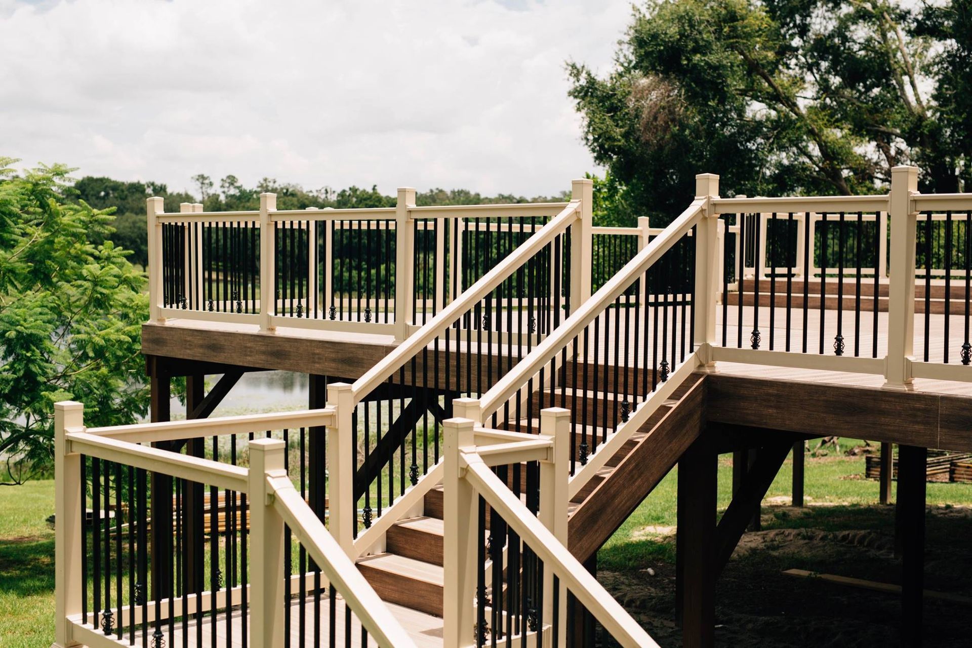 A wooden deck with stairs leading up to it