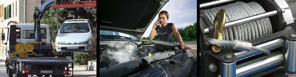 Car being towed, person talking on phone with car trouble, close-up of a winch.