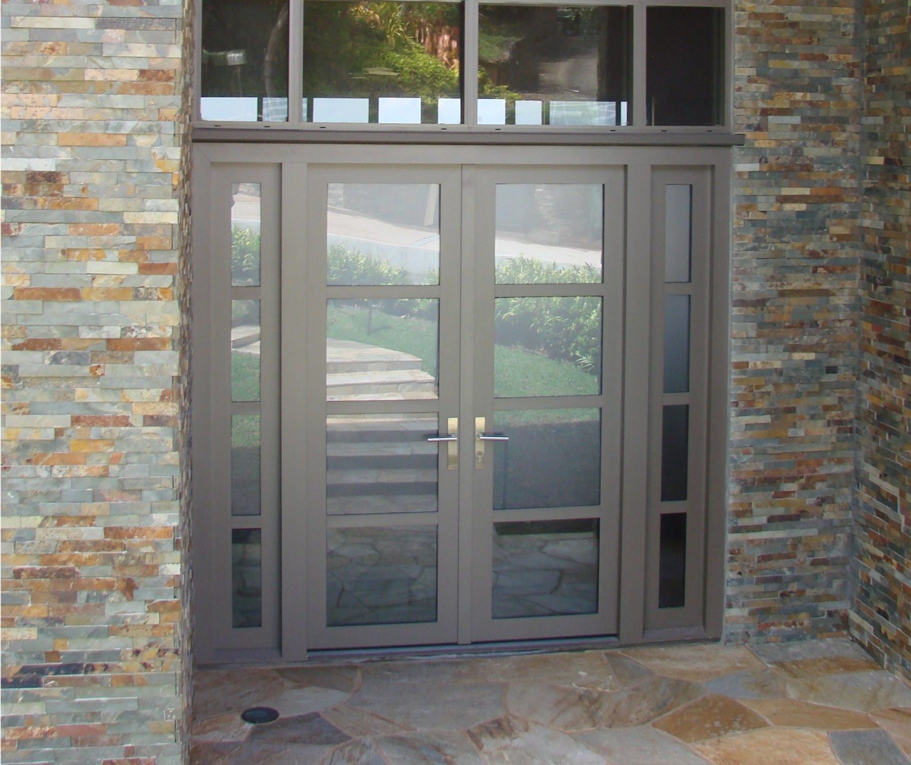 A door with a stone wall behind it
