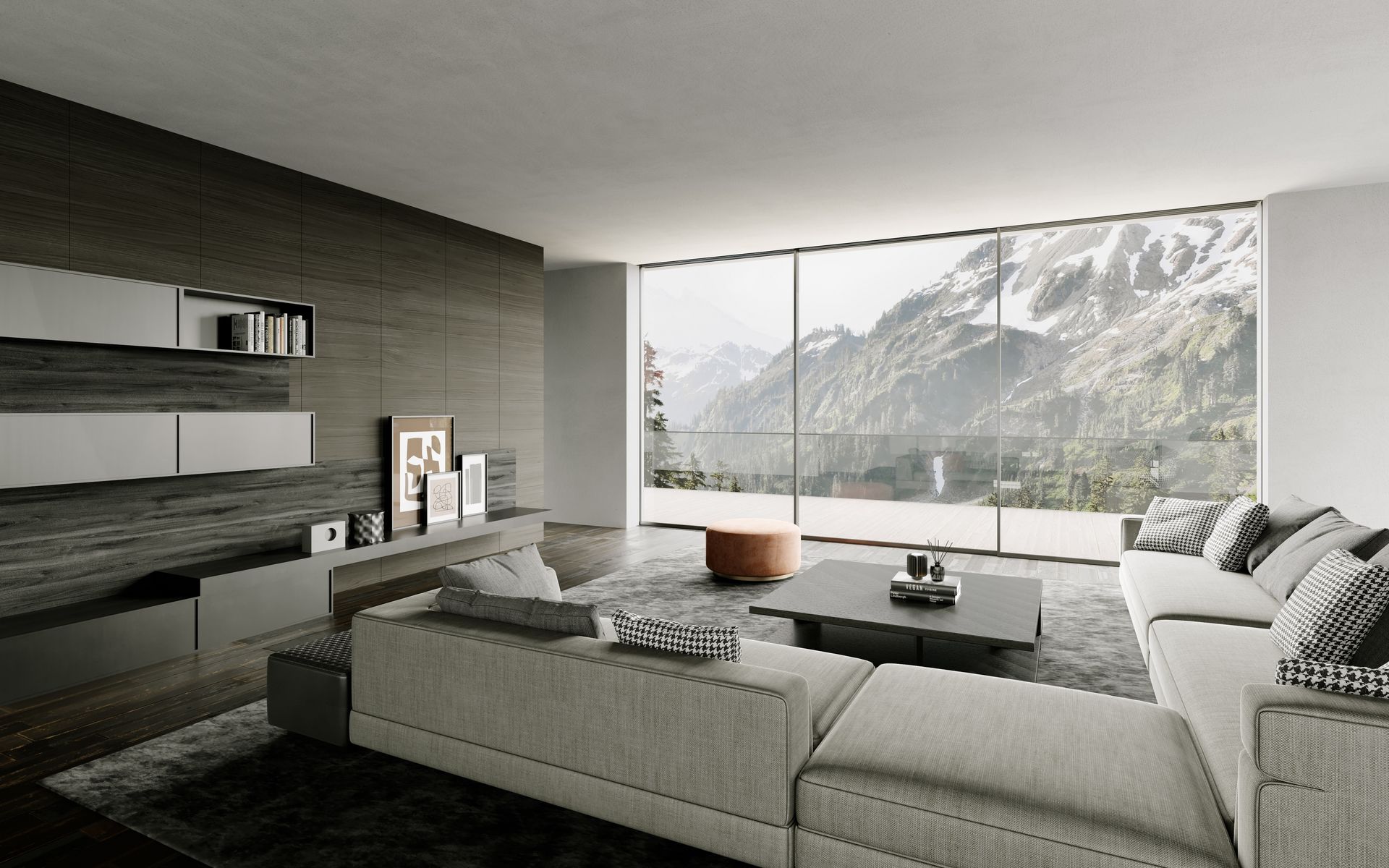 A living room with a couch , coffee table , and mountains in the background.