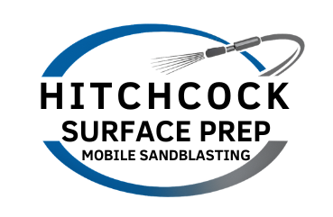 A black and white logo for hitchcock surface prep.
