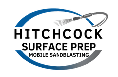 A black and white logo for hitchcock surface prep.