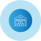 An icon of a warehouse with boxes in it in a blue circle.