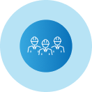 A group of people wearing hard hats in a blue circle.