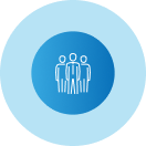 A group of people wearing hard hats in a blue circle.