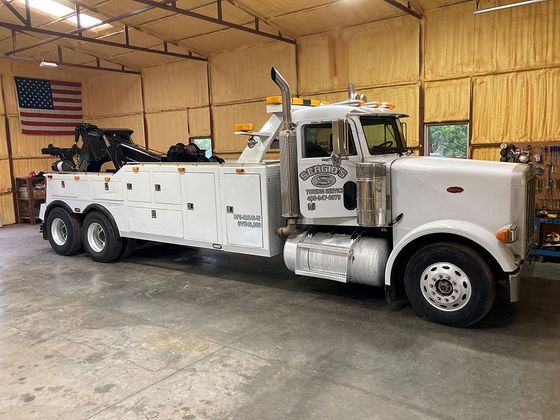 Tow Truck Inside Garage — Oklahoma City, OK — Sergio’s Towing Service