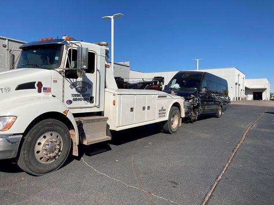 Towing A Black Van — Oklahoma City, OK — Sergio’s Towing Service
