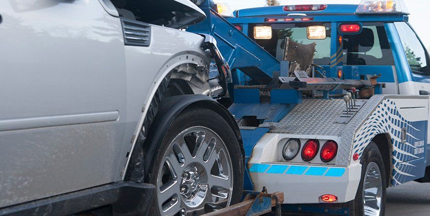 Towed Grey Car — North Providence, RI — Town Line Service & Towing
