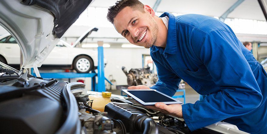 Smiling Mechanic — North Providence, RI — Town Line Service & Towing